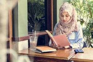 Islamic woman reading book